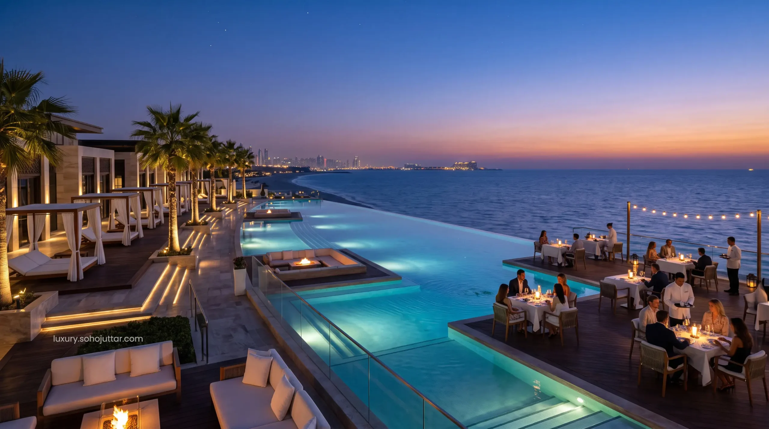Twilight view of an exclusive 7-star luxury resort pool deck and beachfront dining in the UAE.